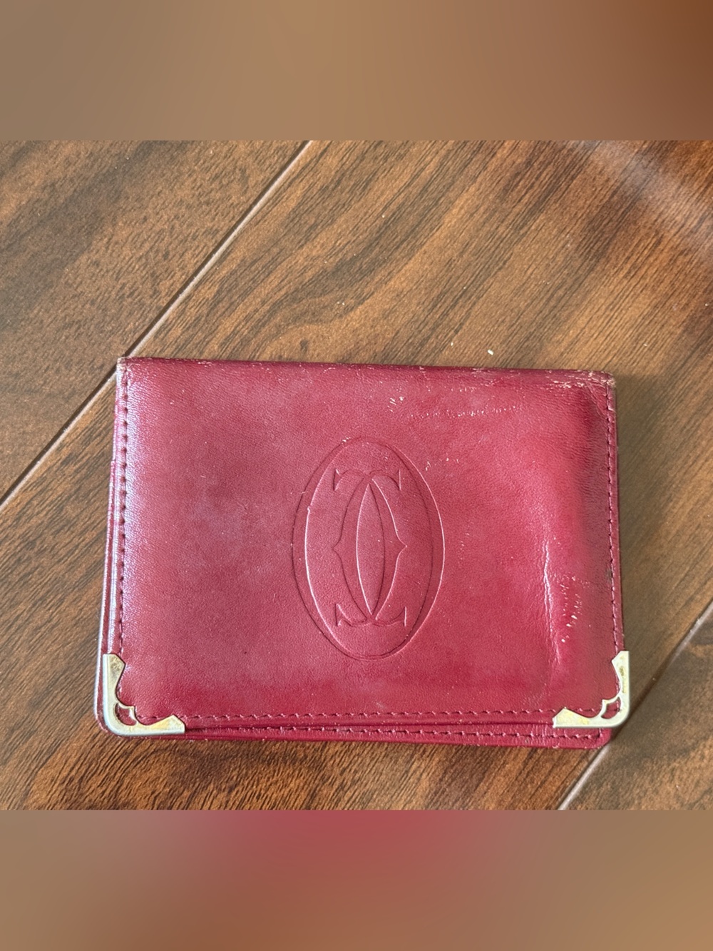 Vintage Cartier Paris Burgundy Leather Wallet with Gold Corner Accents